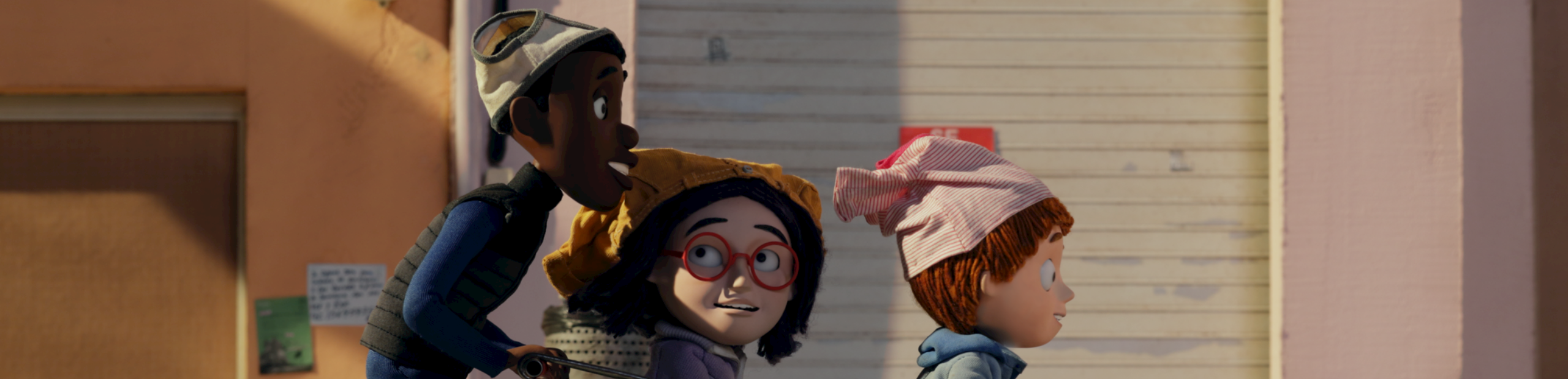 animations de trois enfants qui se poussent dans un caddie de supermarché